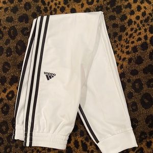 Adidas casual pants NEW NO TAG with logo and outside seam stripes